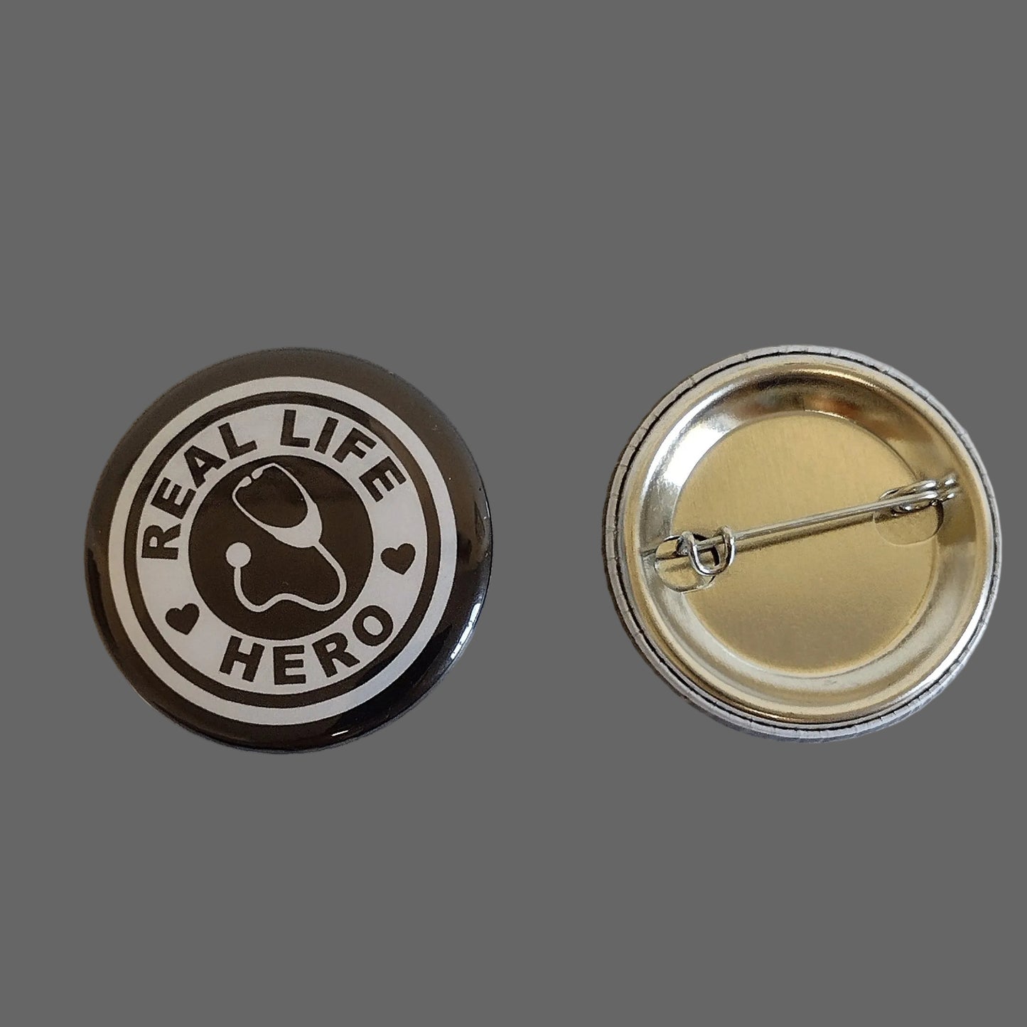Real Life Hero, Black Pin-Buttons, 1.5" (10-Pk)