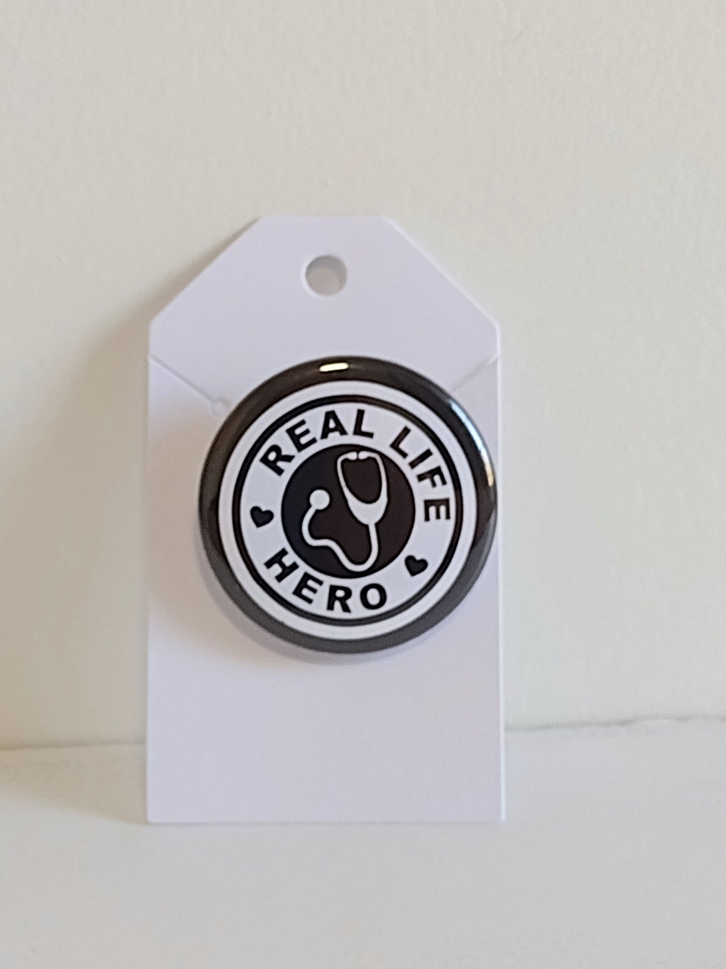Real Life Hero, Black Pin-Buttons, 1.5" (10-Pk)
